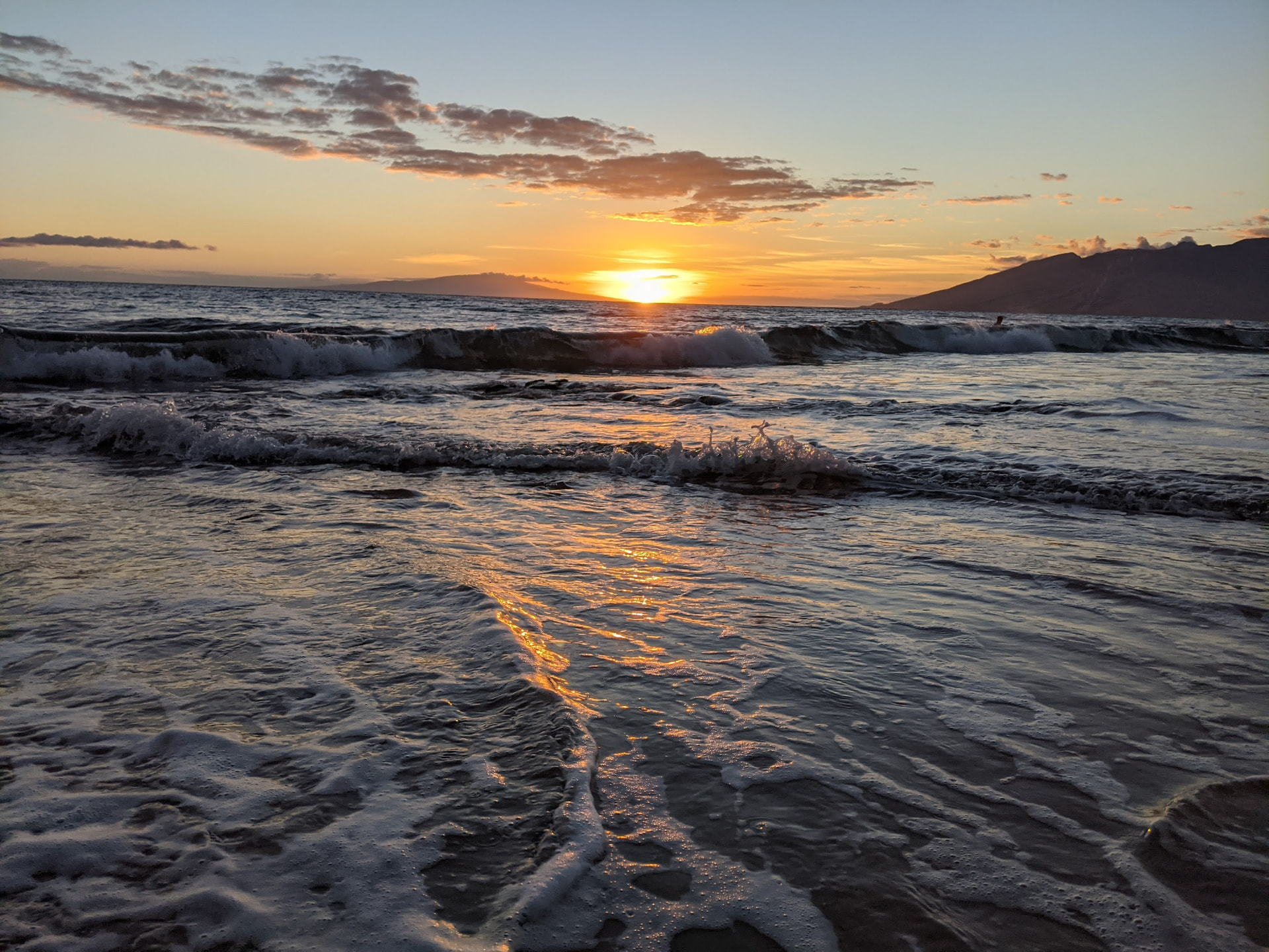 Sunset reflecting across the waves