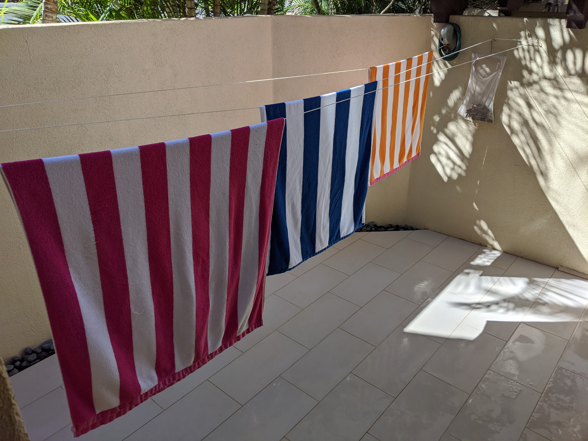 Alternate view of the private patio and beach towels