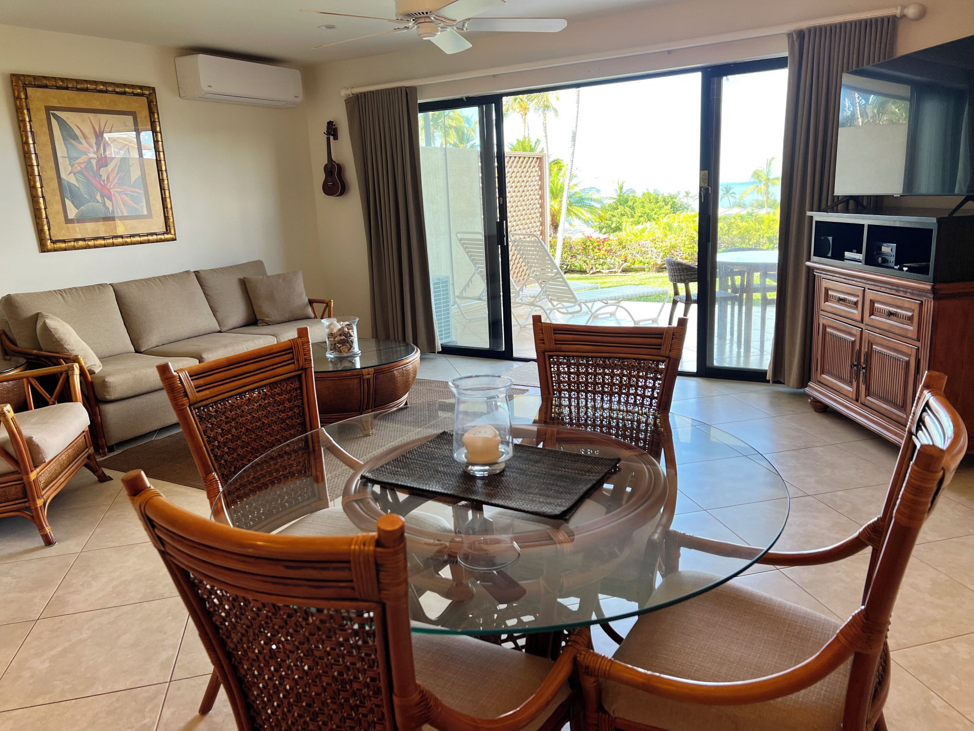 Open living and dining room looking toward the private lanai