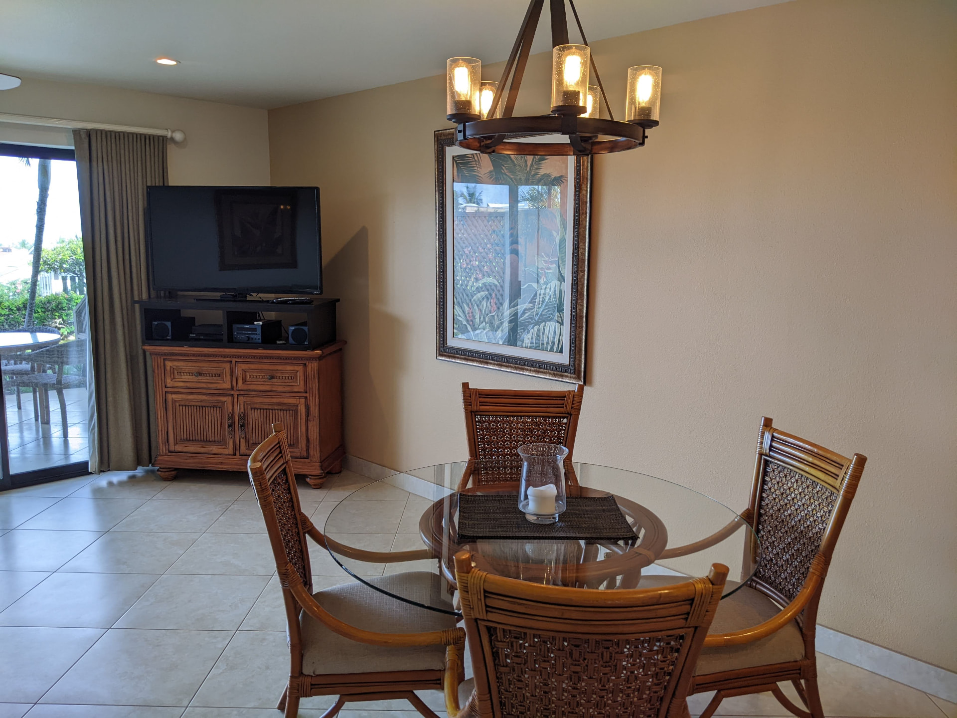 Glass dining table and entertainment cabinet