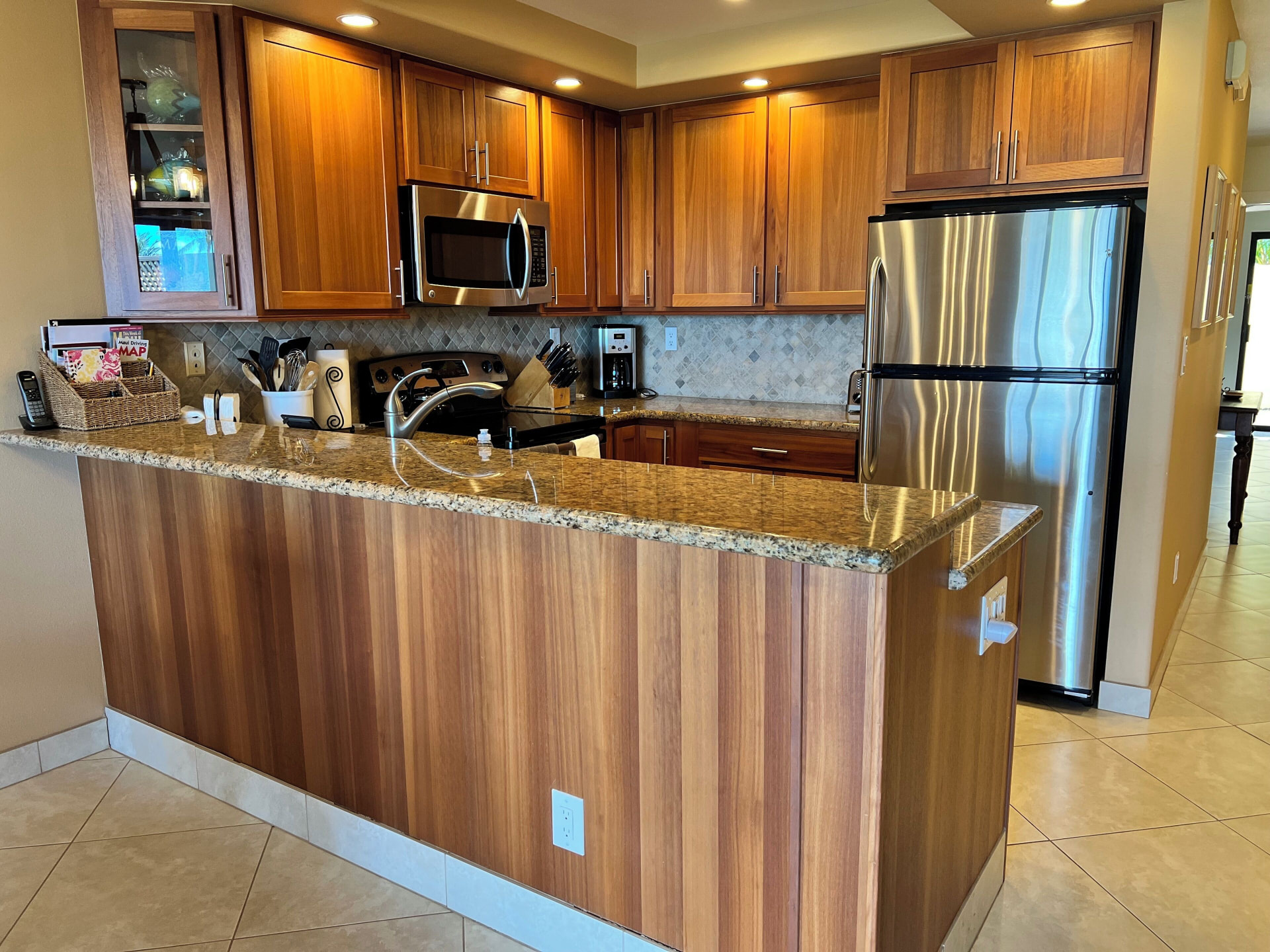 Kitchen with granite counter and stainless steel appliances