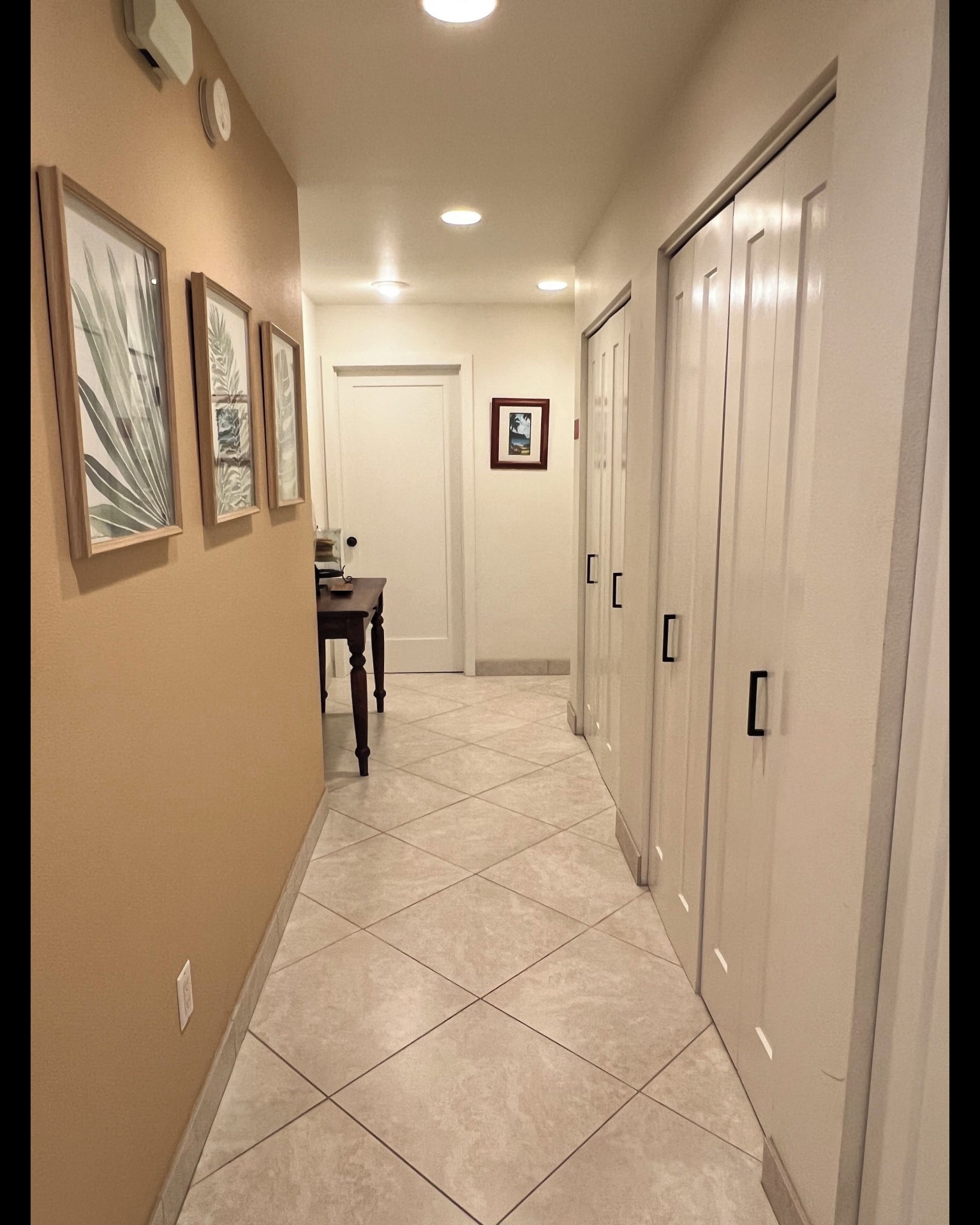 Hallway with generous closet storage